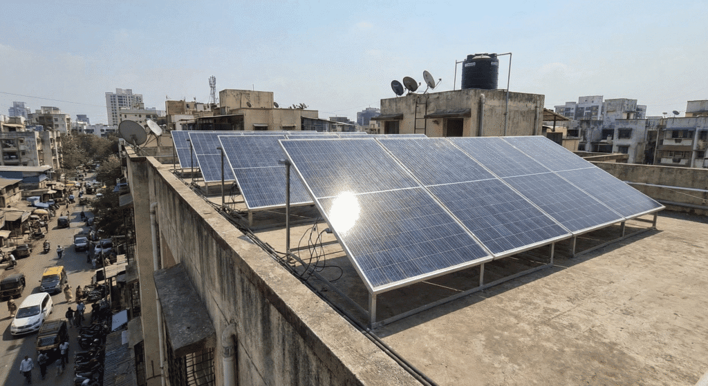Rooftop array showing how much electricity does a solar panel produce in Indian conditions